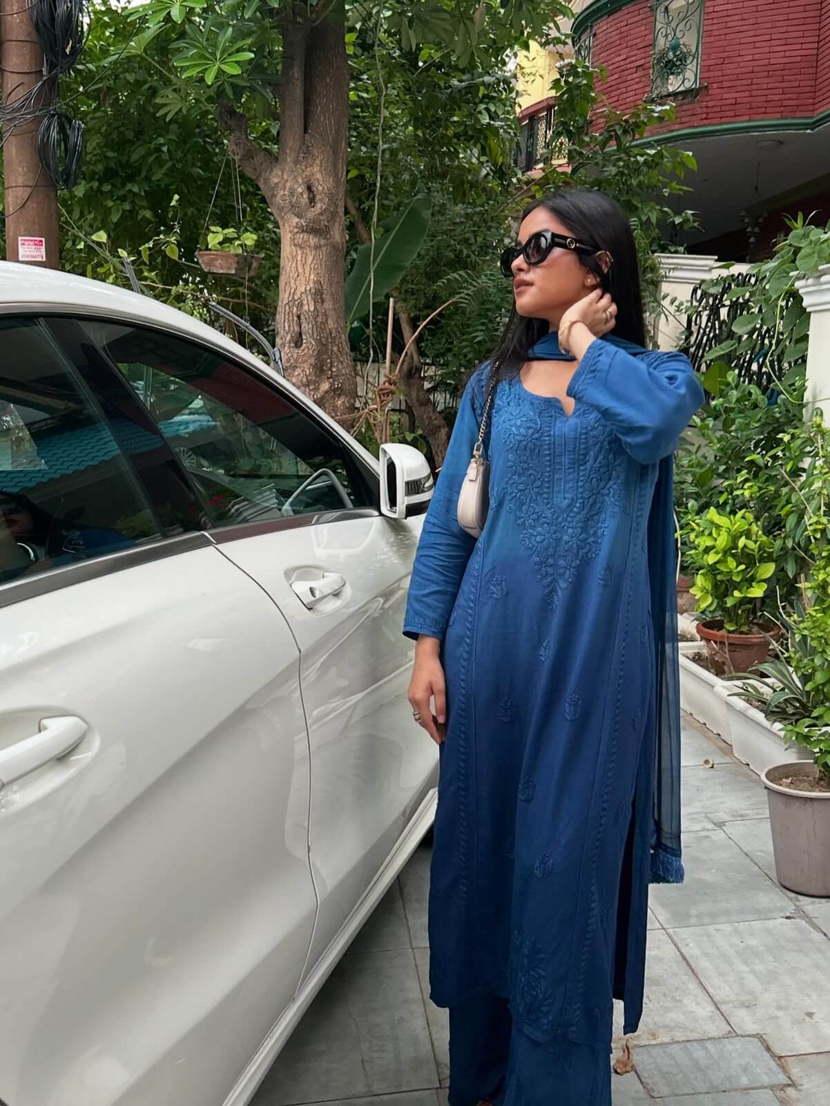 Customer in a royal blue chikankari kurta set