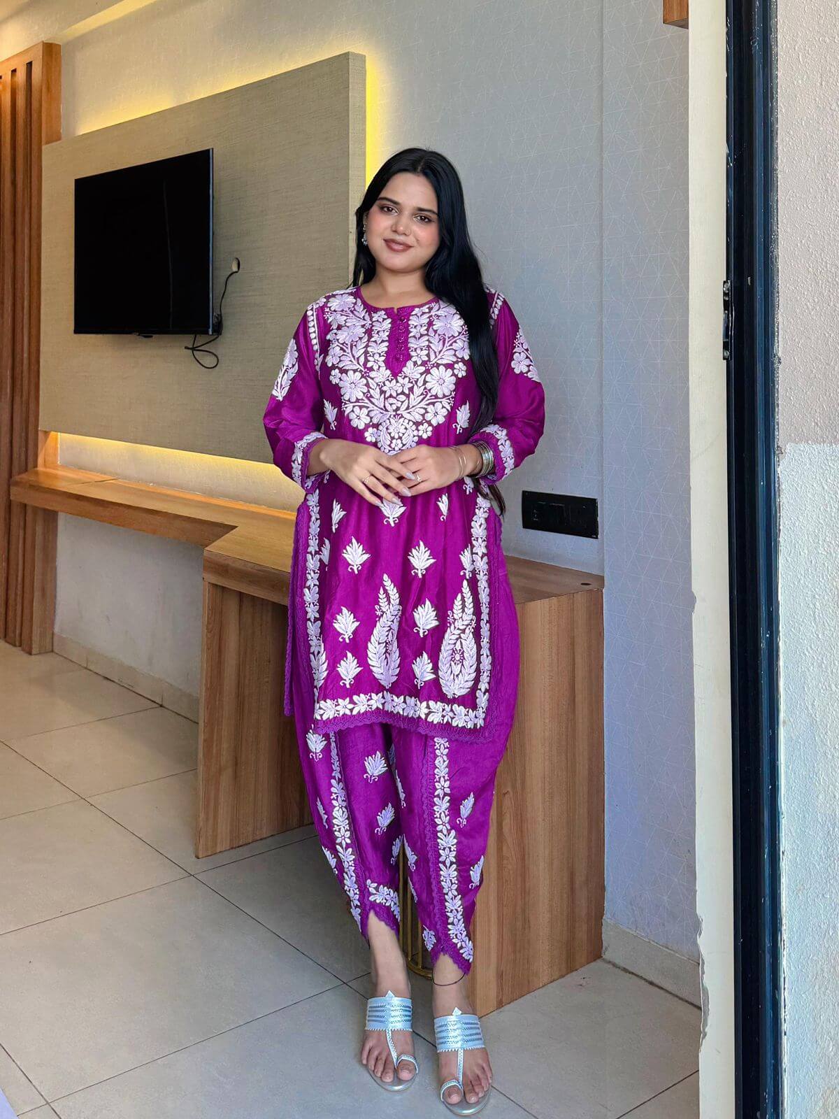 Customer in a magenta chikankari co-ord set